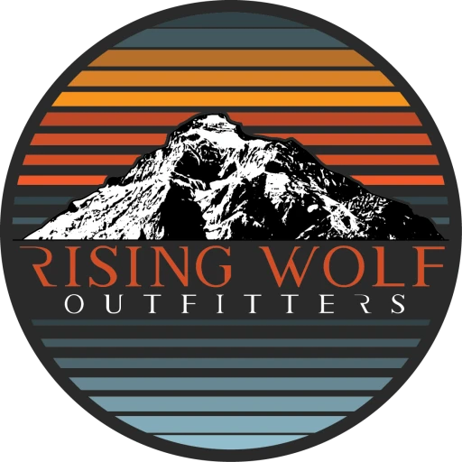 Rising Wolf Outfitters logo — Indigenous-owned outfitter in East Glacier Park